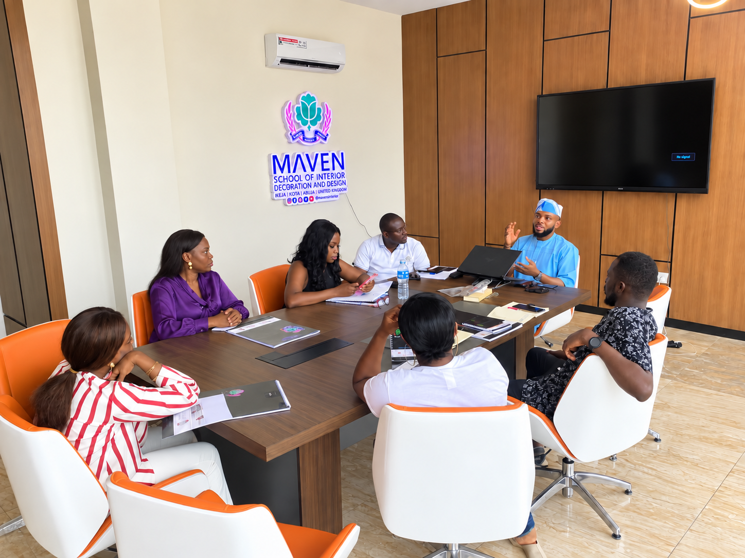 A design class in session around the table at the Lekki campus